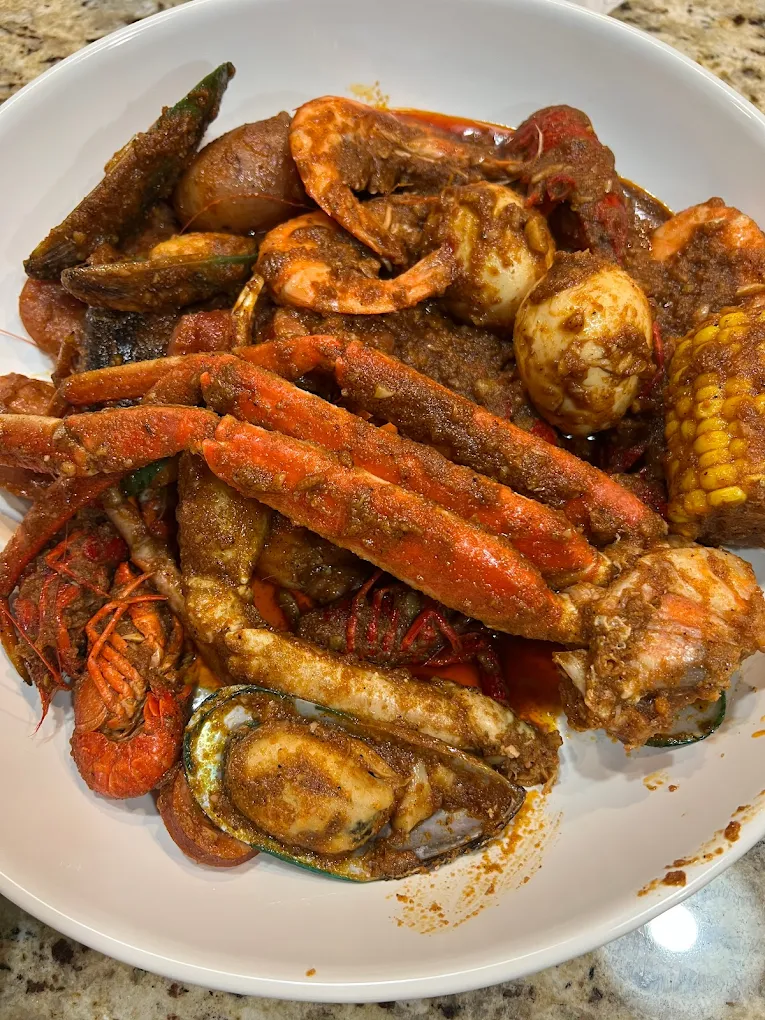 Authentic Cajun snow crab legs and crawfish boil with seasoned potatoes near Cal State Bakersfield